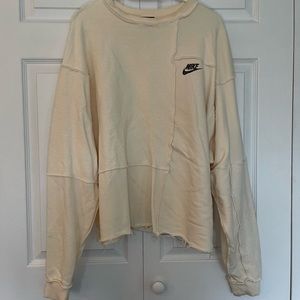 NIKE sweatshirt with patchwork design and raw hem